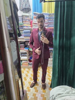 Clothes made at Phuoc Tailor, photo by a customer (Benjamin Zavala)
