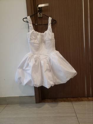 Clothes made at Tiệm may Bông hoa/Blooming Tailor, photo by a customer (Jabu Mbhele)