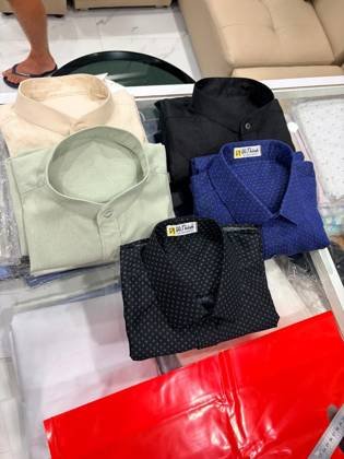 Clothes made at Vũ Thành Tailor, photo by a customer (Luis)
